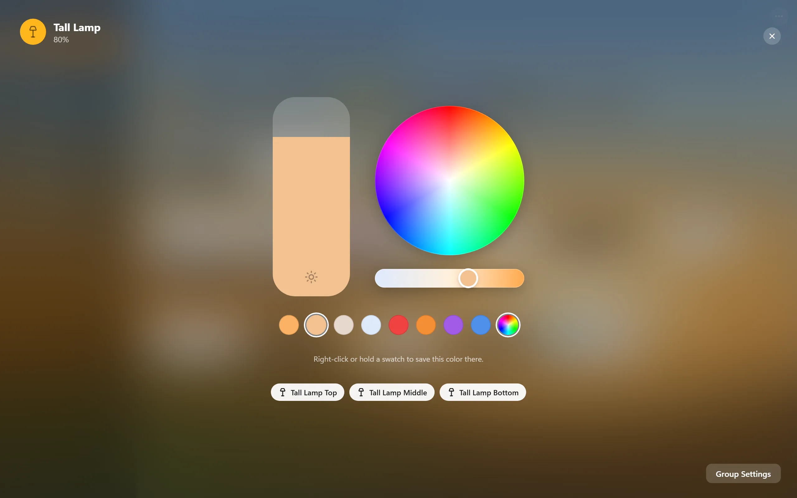 A light group's controls with a brightness slider, color wheel, and saved colors